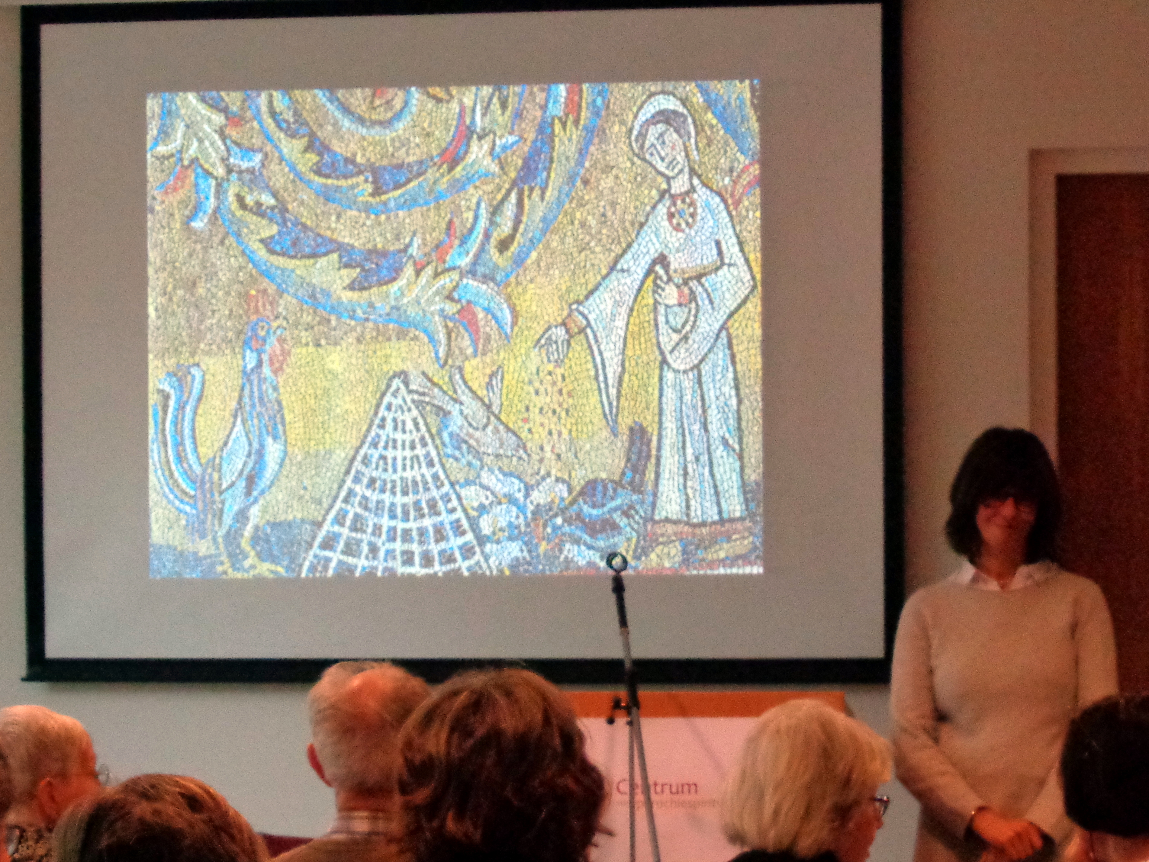 woman feeding the birds