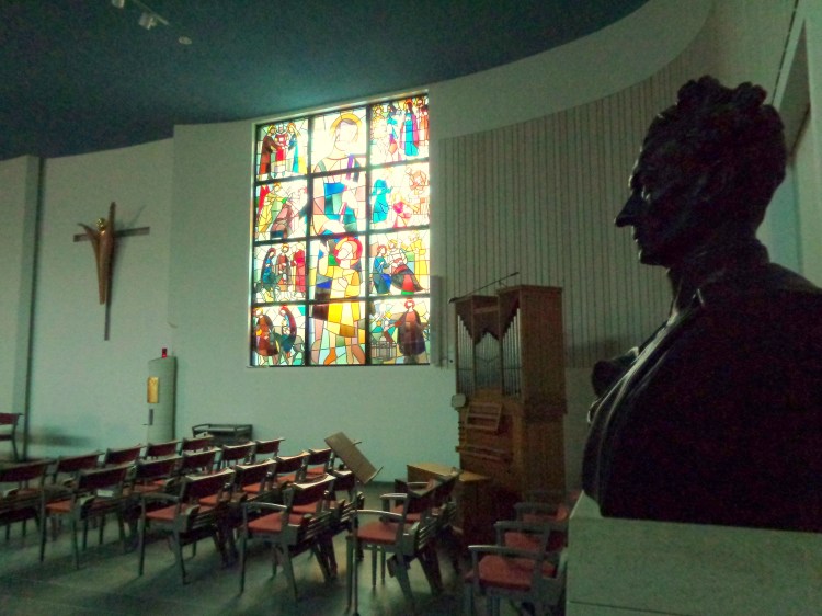 Pater Eymard looks on